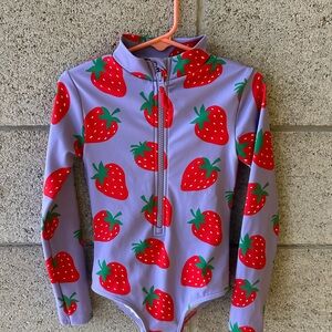 Kids Swim Strawberry Print Long Sleeve Swimsuit by Mini Boden.